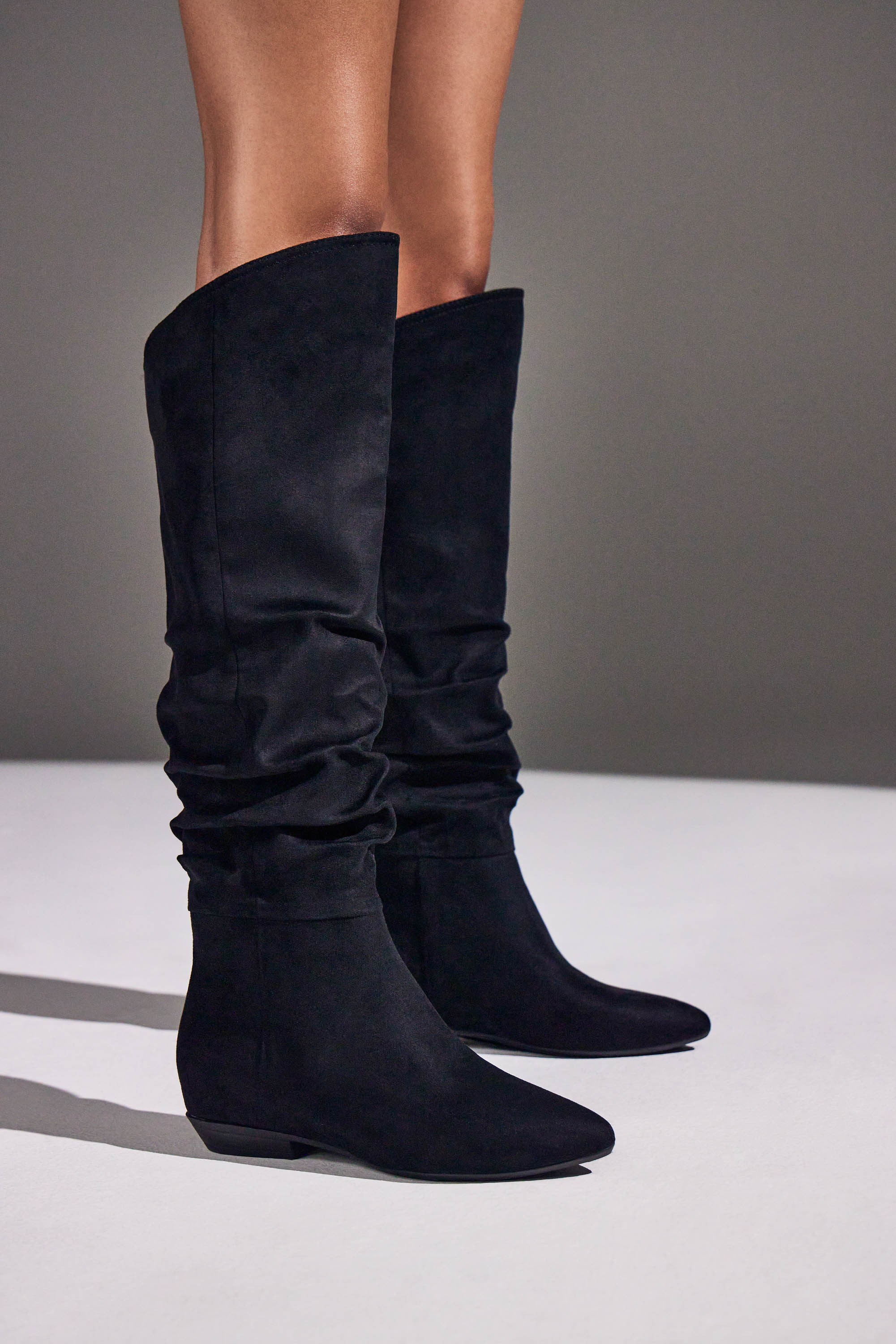 Issey Flat Boot in Black Caviar - Get great deals at ShoeDazzle
